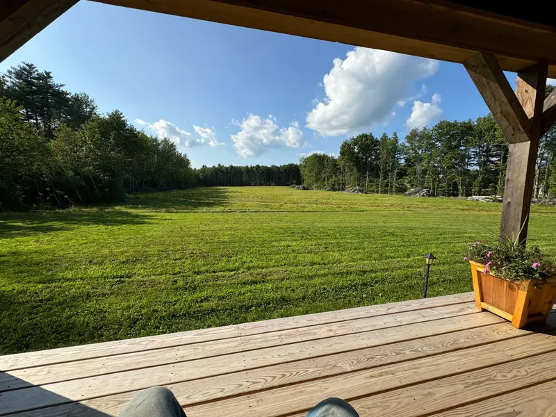 Open field and tree line at Boynton Brook Farm