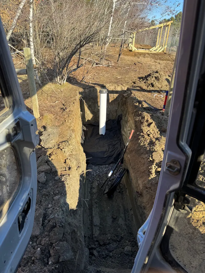 Foundation excavation dug to full depth on a wooded lot