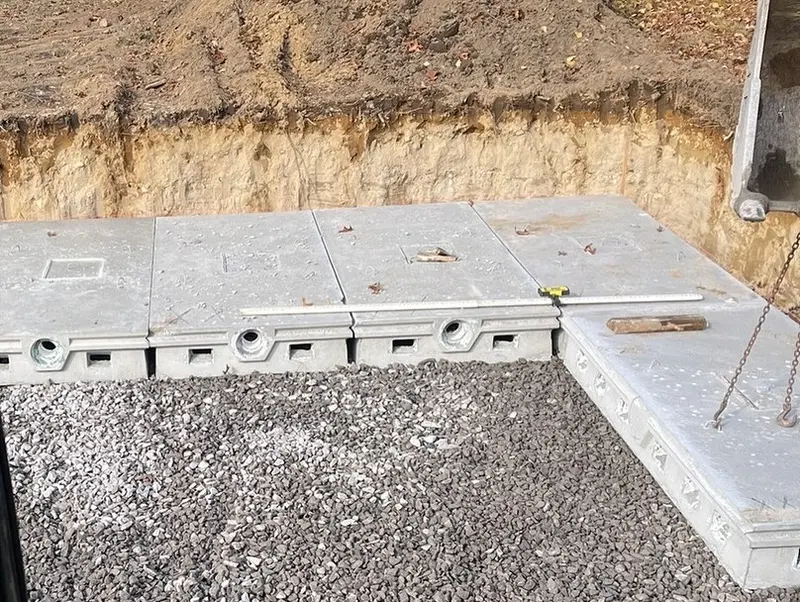 Concrete leaching galleys set level on a crushed stone bed