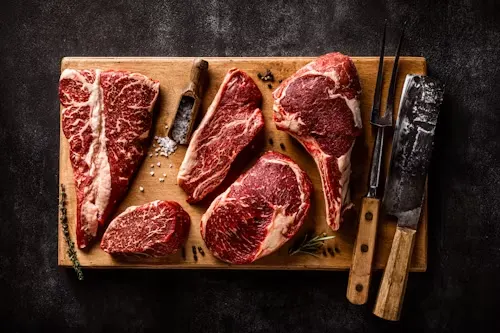 Variety of premium beef cuts on a cutting board