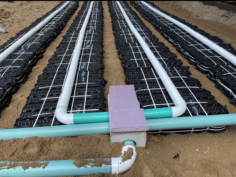 Septic leach field rows piped and ready for cover