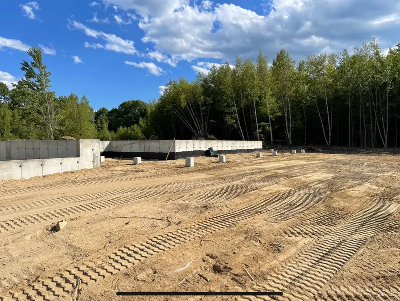 Poured concrete foundation walls on a graded lot